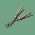 Gardening scissors on green background Royalty Free Stock Photo