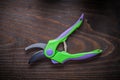 Gardening secateurs isolated on vintage wooden
