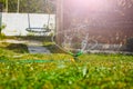 Gardening sprinkle irrigate garden lawn spraying water close-up