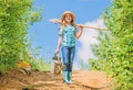 Gardening tips. Spring gardening. Girl child hold shovel watering can. Spring gardening checklist. Little helper Royalty Free Stock Photo