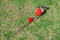 Gardening tools on grass green background