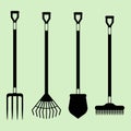 Gardening tools vector set silhouette, garden shovel, fork and rake ina black color, isolated on light-green background Royalty Free Stock Photo