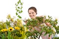 Gardening - Woman with Rhododendron flower blossom Royalty Free Stock Photo