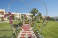 Gardens in grounds of a tropical hotel resort with romantic pagoda