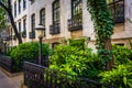 Gardens and townhouses along 23rd Street in Chelsea, Manhattan,