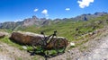 Gardetta - Mountain bike on scenic trail with view of Rocca La Meja in Maira valley in the Cottian Alps, Piedmont Royalty Free Stock Photo