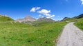 Gardetta - Scenic mtb trail with view of Rocca La Meja on the Italy French border in Maira valley in the Cottian Alps, Piedmont Royalty Free Stock Photo