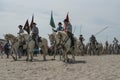 Gardians and camargue horses on the beach Royalty Free Stock Photo