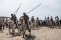 Gardians and camargue horses on the beach Royalty Free Stock Photo