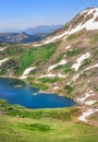 Gardner Lake, Beartooth Pass. Peaks of Beartooth Mountains, Shoshone National Forest, Wyoming, USA. Vertical layout. Royalty Free Stock Photo