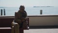 GARDONE RIVIERA, ITALY - MAY 23, 2019: statue of Gabriele D`Annunzio reads book