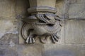 Gargoyle carved on one of the external walls of Westminster Abbey founded by Benedictine monks in