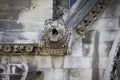 Gargoyle carved on one of the external walls of Westminster Abbey founded by Benedictine monks in