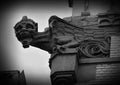 Gargoyle - fabulous creature, medieval architectural building element designed to convey water from a roof and away from the side Royalty Free Stock Photo