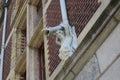 Gargoyle hold by a man Royalty Free Stock Photo