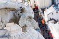 Gargoyle looking down a street in Paris Royalty Free Stock Photo
