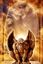Magic gargoyle standing in magic gate with sunset sky Royalty Free Stock Photo