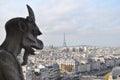 Gargoyle of Notre Dame Cathedral, with the city of Paris in the background, France Royalty Free Stock Photo