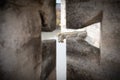 Gargoyle seen through an arrowslit, Tarascon Castle, France Royalty Free Stock Photo