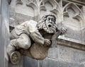 Gargoyle on wall of Rathaus or Town Hall on Marienplatz Square, Munich, Bavaria, Germany. Gothic statue like medieval guitar Royalty Free Stock Photo