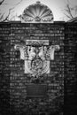 Gargoyles art on brick wall at Rockefeller greenhouse park Royalty Free Stock Photo