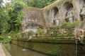 Gargoyles with holy water in the complex of royal tombs of the Udayan dynasty. Ancient royal tombs at Gunung Kawi Temple. Funeral