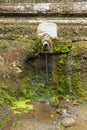 Gargoyles with holy water in the complex of royal tombs of the Udayan dynasty. Ancient royal tombs at Gunung Kawi Temple. Funeral