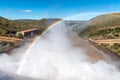 The Gariep Dam overflowing. A rainbow is visible Royalty Free Stock Photo