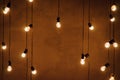 Garland of edison lamps on a wooden backgroundn Royalty Free Stock Photo