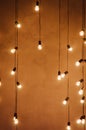 Garland of edison lamps on a wooden backgroundn Royalty Free Stock Photo