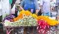 Garland flowers selling in table shop in Thai walking market Royalty Free Stock Photo