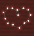 Garland heart shaped on wooden background for Valentine Day