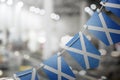 A garland of Scotland national flags on an abstract blurred background Royalty Free Stock Photo