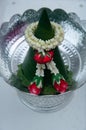 Garland in top of banana leaf cone is a gift in Thai wedding ceremony