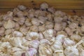 Garlic background. Fresh garlic on the market table closeup photo