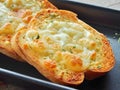 Garlic bread with cheese. Royalty Free Stock Photo