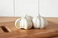 Garlic on brown cutting bamboo board