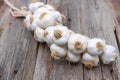 Garlic brunch closeup wood old background