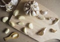 Garlic Bulb and Garlic Cloves on Wooden chopping board Royalty Free Stock Photo