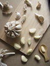 Garlic Bulb and Garlic Cloves on Wooden chopping Royalty Free Stock Photo