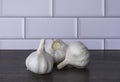 Garlic bulb on gray wooden background Royalty Free Stock Photo