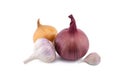 Garlic bulbs, cloves and red yellow onion on white Royalty Free Stock Photo