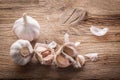 Garlic bulbs and cloves on wooden table Royalty Free Stock Photo