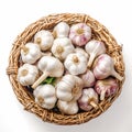 Garlic bulbs neatly arranged in wicker basket on white background Royalty Free Stock Photo