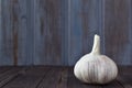 Garlic. Garlic and garlic bulbs on a purple background wooden table Royalty Free Stock Photo