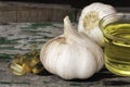 Garlic bulbs on wooden background Royalty Free Stock Photo