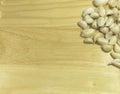 Garlic bulbs on wooden chopping board