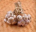 Garlic bunches on a bamboo basket