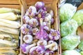 Garlic, cabbage and corn for sale in local marketplace Royalty Free Stock Photo