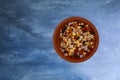 Garlic and chili seasoning in a small clay bowl top view